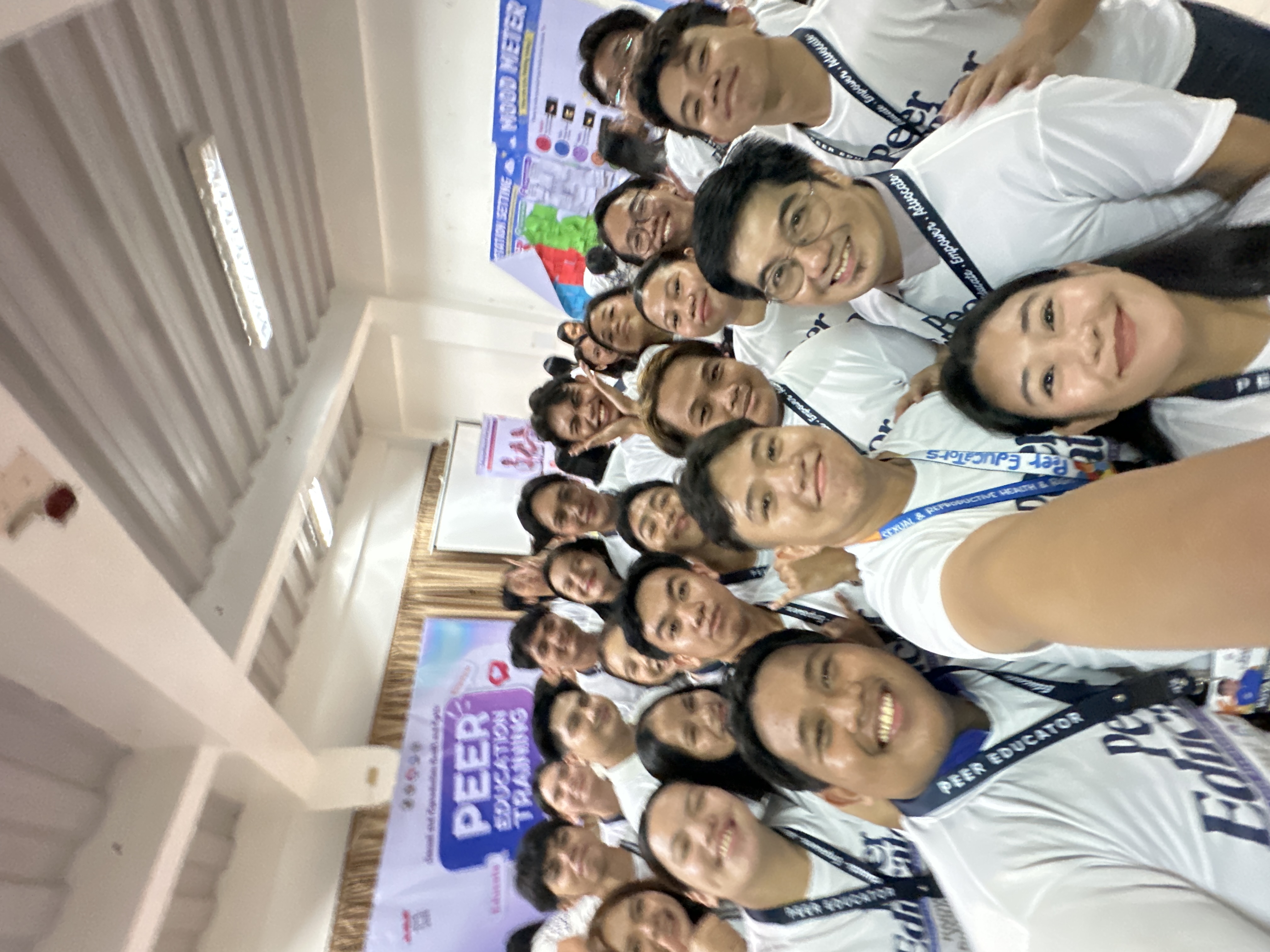 CAPE peer educators taking a group selfie during the training